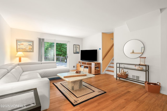 4 Hamilton Hill Rd, Lincroft, NJ 07738 - living area with wood finished floors and stairs