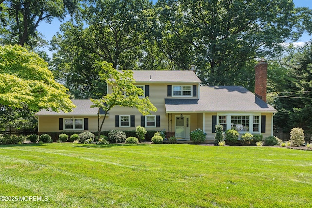 4 Hamilton Hill Rd, Lincroft, NJ 07738 - view of front of property featuring a front lawn and a chimney