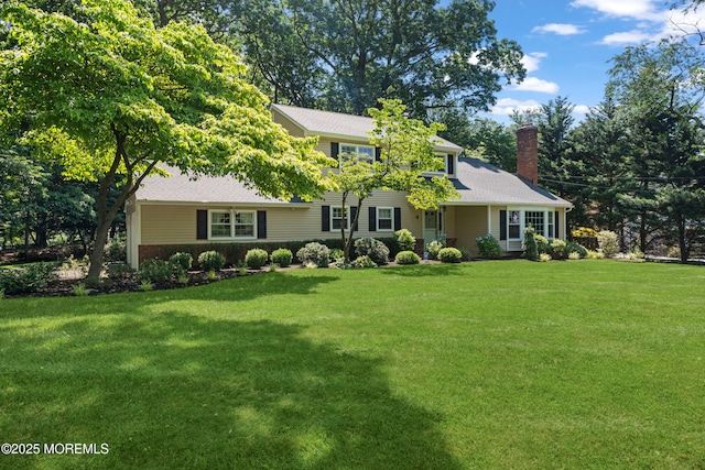 4 Hamilton Hill Rd, Lincroft, NJ 07738 - view of front of property with a chimney and a front lawn