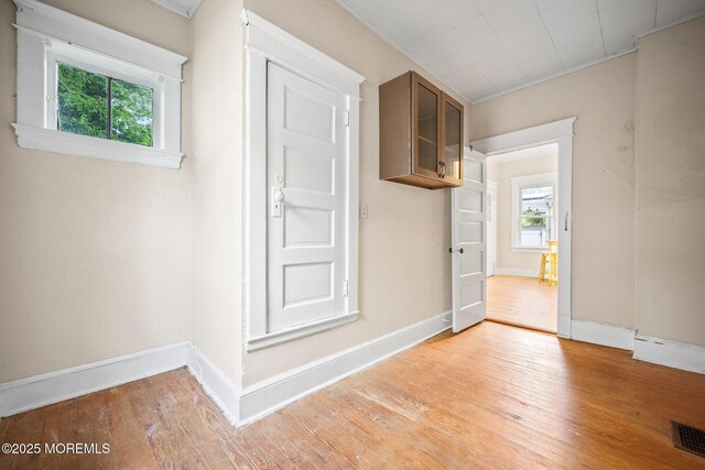 16 Steiner Ave, Neptune City, NJ 07753 - spare room with light wood finished floors and ornamental molding