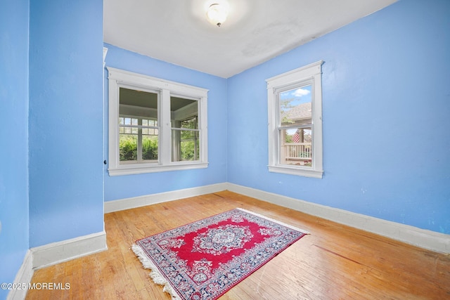 16 Steiner Ave, Neptune City, NJ 07753 - spare room with healthy amount of natural light and wood-type flooring