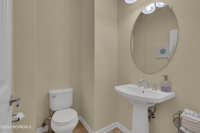 119 Dupont Ave Unit 2A, Seaside Heights, NJ 08751 - half bathroom featuring toilet and baseboards