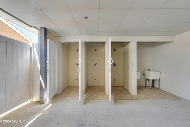 119 Dupont Ave Unit 2A, Seaside Heights, NJ 08751 - basement with a paneled ceiling and carpet floors