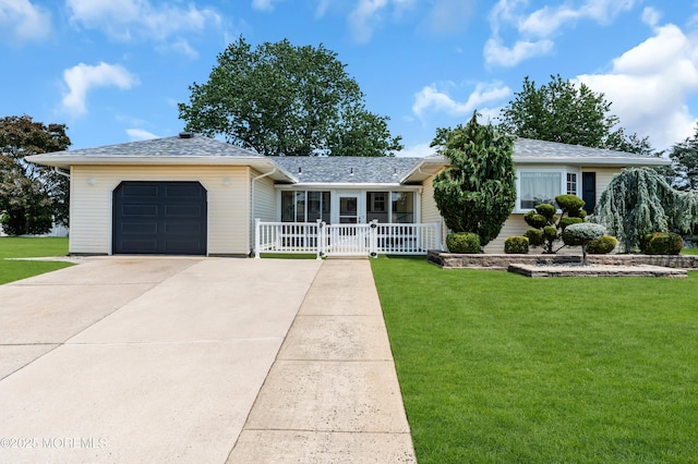 13 Canaries Ct, Toms River, NJ 08757 - ranch-style home featuring a front lawn, a garage, and driveway