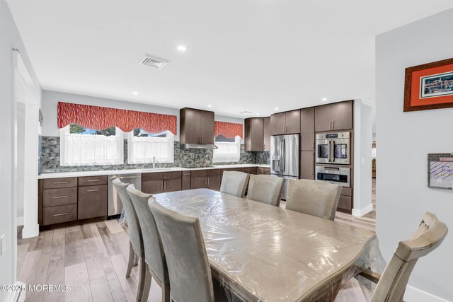 13 Canaries Ct, Toms River, NJ 08757 - dining space with light wood-type flooring and recessed lighting