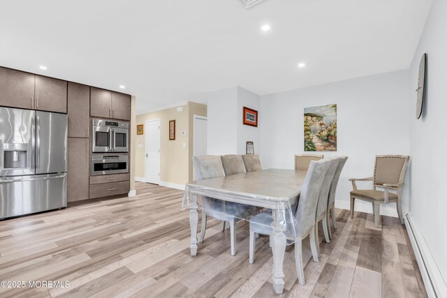 13 Canaries Ct, Toms River, NJ 08757 - dining area featuring baseboard heating, light wood-style flooring, and recessed lighting