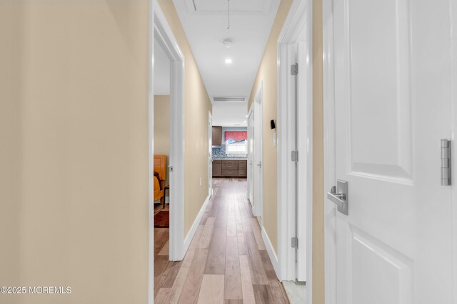 13 Canaries Ct, Toms River, NJ 08757 - corridor with light wood-style flooring and attic access