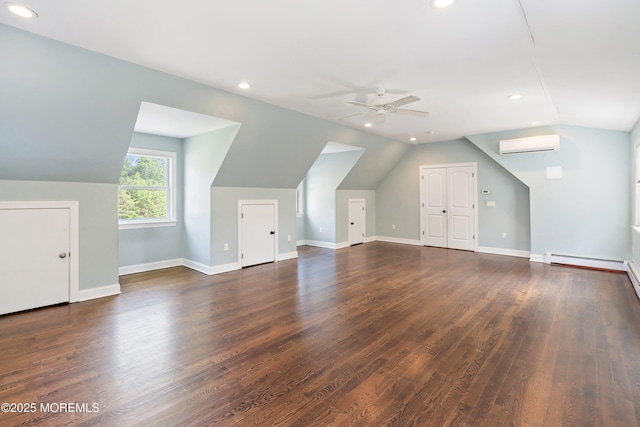 7 Rodeo Ct, Howell, NJ 07731 - bonus room featuring an AC wall unit, vaulted ceiling, a ceiling fan, wood finished floors, and recessed lighting