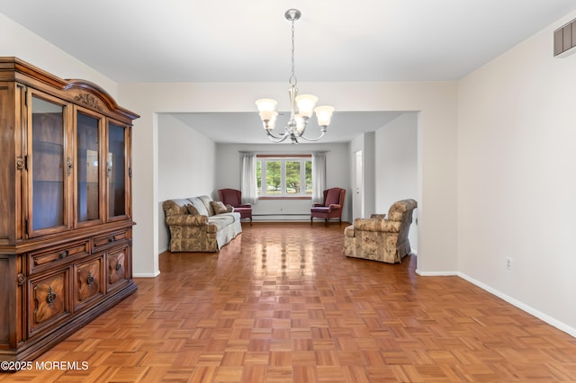 3 Shaw Ct, Toms River, NJ 08757 - living area with baseboards and a chandelier