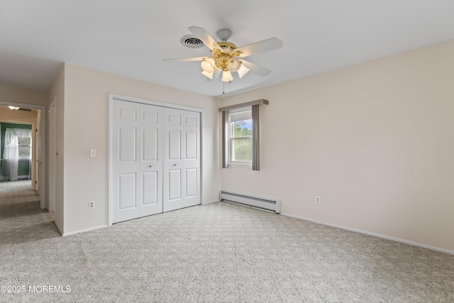 3 Shaw Ct, Toms River, NJ 08757 - unfurnished bedroom featuring baseboard heating, carpet flooring, a closet, and ceiling fan