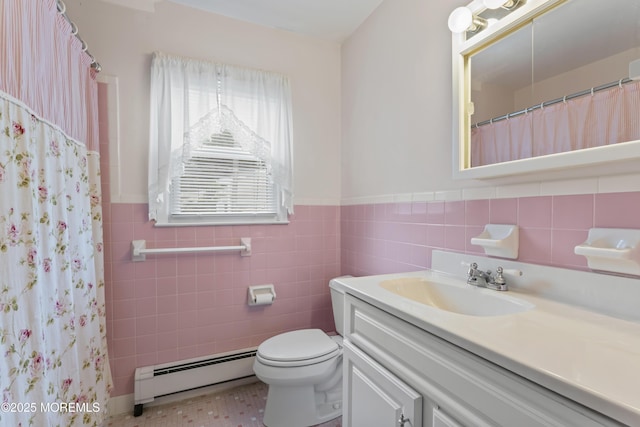 3 Shaw Ct, Toms River, NJ 08757 - bathroom with a baseboard radiator, vanity, tile walls, a wainscoted wall, and curtained shower