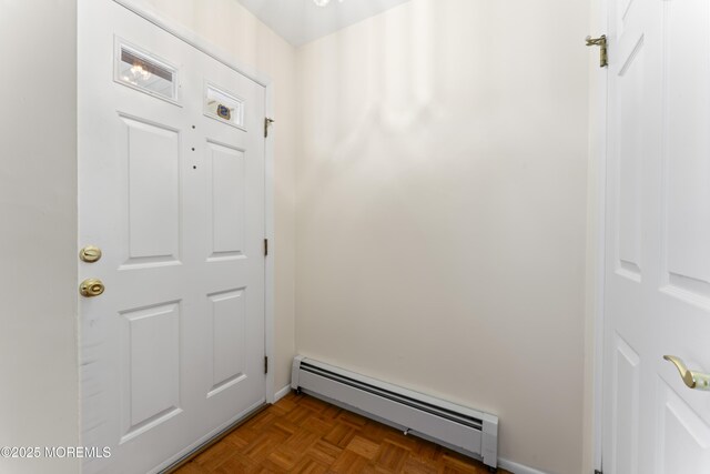 3 Shaw Ct, Toms River, NJ 08757 - doorway to outside with baseboard heating