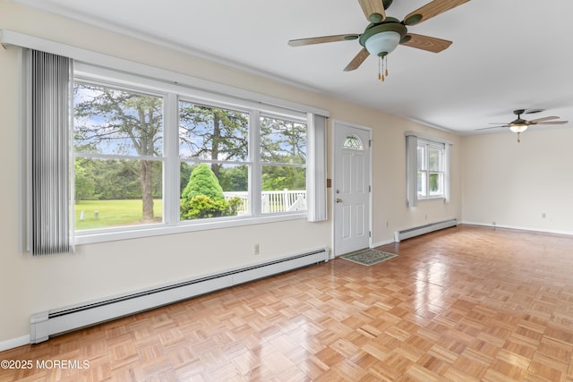 3 Shaw Ct, Toms River, NJ 08757 - spare room featuring a baseboard heating unit and a ceiling fan