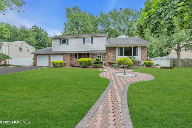 25 Canadian Woods Rd, Marlboro, NJ 07746 - tri-level home featuring brick siding, driveway, and a chimney