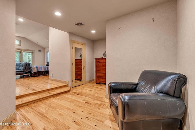 25 Canadian Woods Rd, Marlboro, NJ 07746 - sitting room with wood-type flooring, vaulted ceiling, and recessed lighting