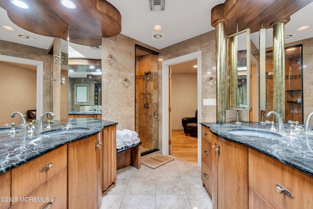 25 Canadian Woods Rd, Marlboro, NJ 07746 - full bath with two vanities, tile patterned floors, a shower stall, and recessed lighting