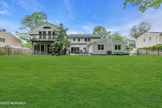 25 Canadian Woods Rd, Marlboro, NJ 07746 - rear view of house featuring a fenced backyard and a patio area