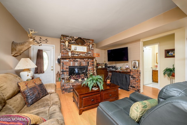 5 Hampton Dr, Jackson, NJ 08527 - living area featuring light wood finished floors and a brick fireplace
