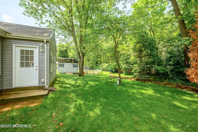 5 Hampton Dr, Jackson, NJ 08527 - view of green lawn with a storage shed