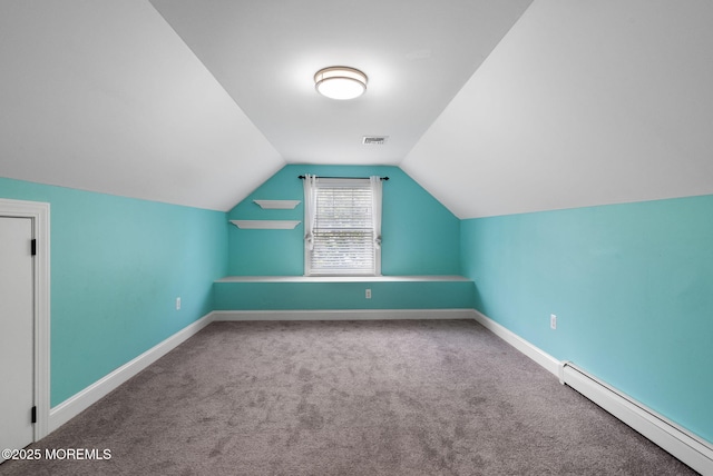58 Pinehurst Rd, Brick, NJ 08723 - bonus room featuring a baseboard radiator, carpet floors, and lofted ceiling