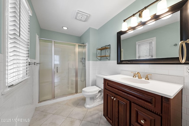 58 Pinehurst Rd, Brick, NJ 08723 - bathroom featuring tile walls, vanity, tile patterned floors, and a shower stall