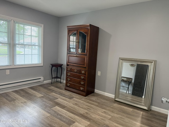 976 Aberdeen Dr Unit D, Lakewood, NJ 08701 - bedroom with baseboard heating and wood finished floors