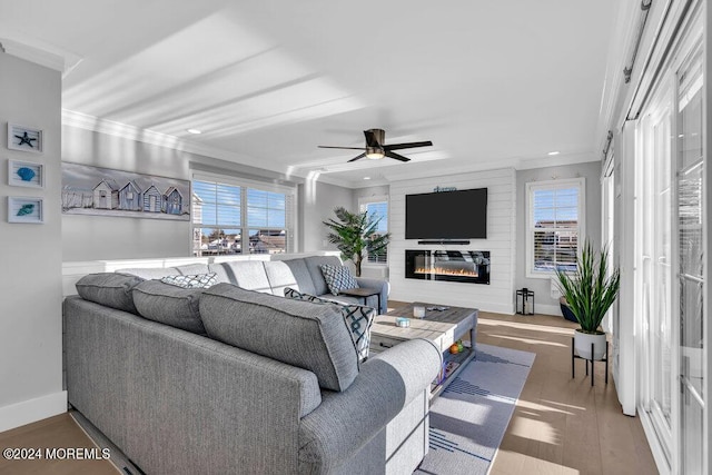 917 Jane Dr, Beach Haven West, NJ 08050 - living room featuring ornamental molding, wood finished floors, a large fireplace, ceiling fan, and recessed lighting
