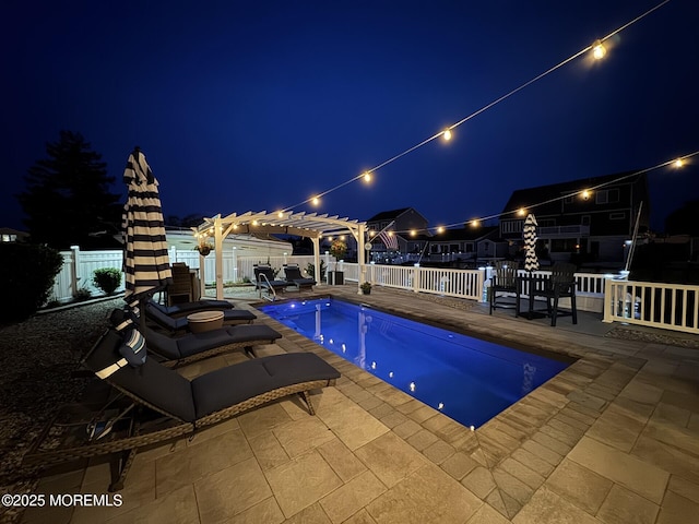 917 Jane Dr, Beach Haven West, NJ 08050 - pool at night featuring a pergola, a fenced backyard, and a patio