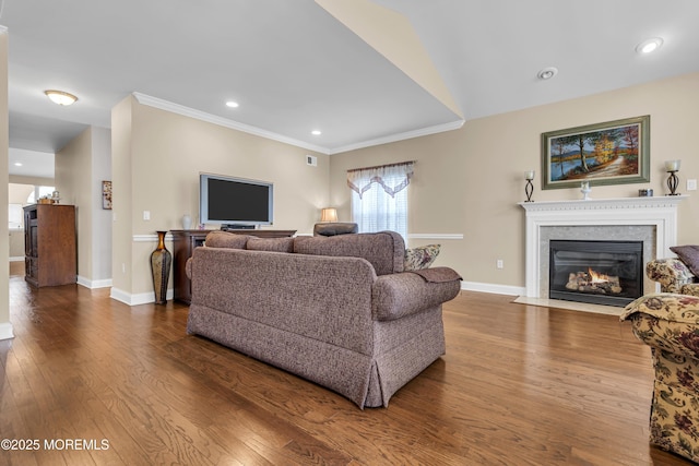 42 Eagleswood Dr, Waretown, NJ 08758 - living area with dark wood finished floors, a fireplace with flush hearth, ornamental molding, and recessed lighting