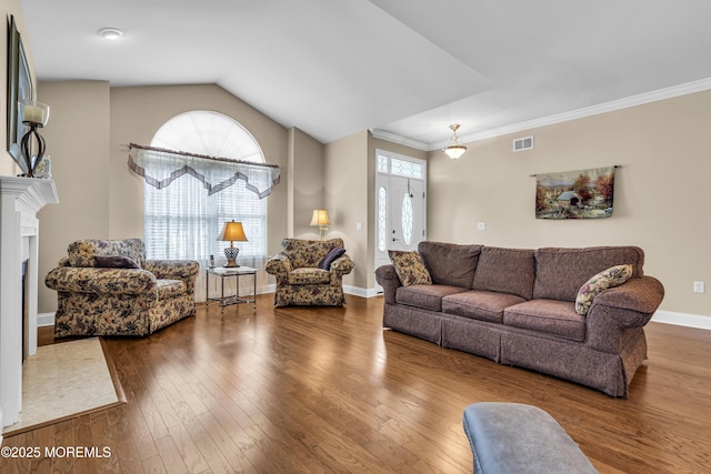 42 Eagleswood Dr, Waretown, NJ 08758 - living room with wood-type flooring, vaulted ceiling, and ornamental molding