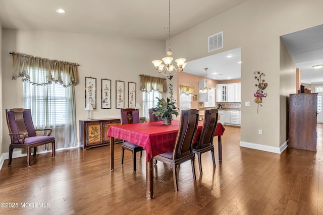 42 Eagleswood Dr, Waretown, NJ 08758 - dining space featuring a chandelier, dark wood-style flooring, a high ceiling, and recessed lighting