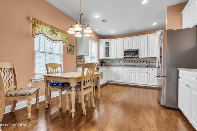 42 Eagleswood Dr, Waretown, NJ 08758 - kitchen with stainless steel appliances, wood-type flooring, decorative backsplash, and recessed lighting