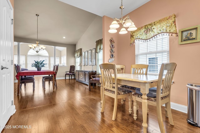 42 Eagleswood Dr, Waretown, NJ 08758 - dining space with a chandelier, wood-type flooring, lofted ceiling, and recessed lighting