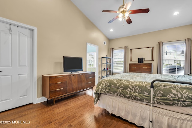42 Eagleswood Dr, Waretown, NJ 08758 - bedroom featuring wood finished floors, multiple windows, recessed lighting, high vaulted ceiling, and ceiling fan