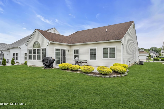 42 Eagleswood Dr, Waretown, NJ 08758 - rear view of property featuring a yard and roof with shingles