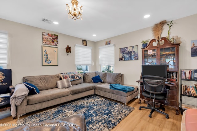 1D Daisy Ct, Lakewood, NJ 08701 - living room featuring wood finished floors, recessed lighting, a chandelier, and an office area