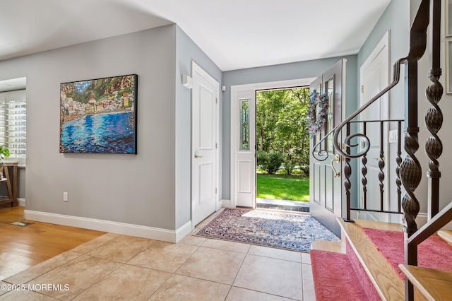 4040 Herbertsville Rd, Wall, NJ 08724 - tiled entryway with stairway
