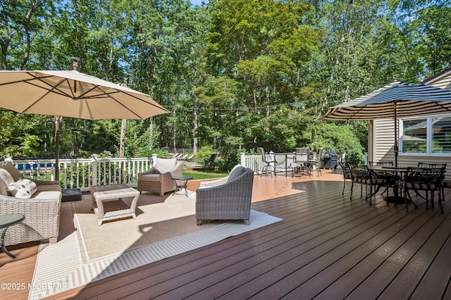 4040 Herbertsville Rd, Wall, NJ 08724 - wooden terrace featuring outdoor dining area, an outdoor living space, and view of wooded area