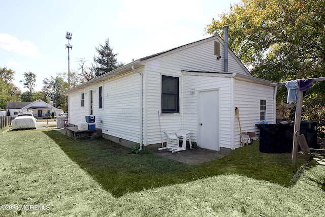 19 E 4th St, Howell, NJ 07731 - rear view of house featuring a lawn and crawl space