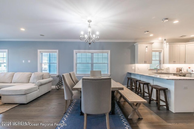 1300 Ocean Ter, Seaside Heights, NJ 08751 - dining room with a chandelier, dark wood finished floors, plenty of natural light, ornamental molding, and recessed lighting