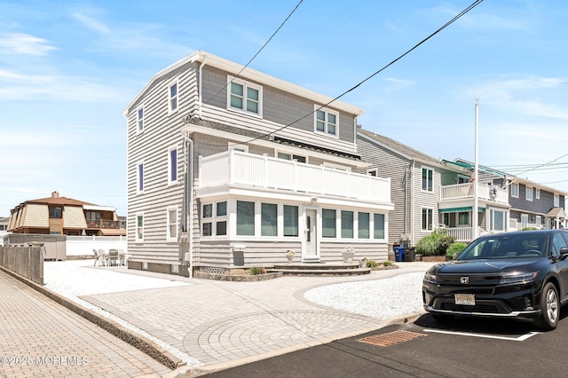 3 Newark Ave, Lavallette, NJ 08735 - townhome / multi-family property featuring a balcony
