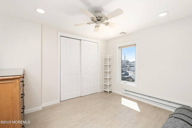 3 Newark Ave, Lavallette, NJ 08735 - unfurnished bedroom featuring baseboard heating, recessed lighting, light wood-style floors, a closet, and a ceiling fan