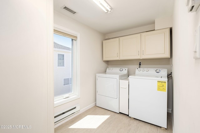 3 Newark Ave, Lavallette, NJ 08735 - laundry area with a baseboard heating unit, cabinet space, washer and dryer, light wood-style floors, and a wall mounted air conditioner