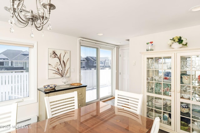 3 Newark Ave, Lavallette, NJ 08735 - dining space with a chandelier, baseboard heating, and recessed lighting