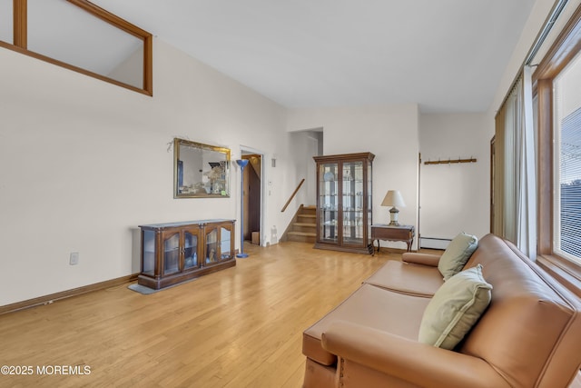 193 Ocean Blvd, Atlantic Highlands, NJ 07716 - living room featuring light wood-style flooring, stairway, and a baseboard radiator
