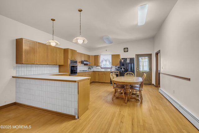 193 Ocean Blvd, Atlantic Highlands, NJ 07716 - kitchen with black appliances, a baseboard heating unit, light countertops, and extractor fan