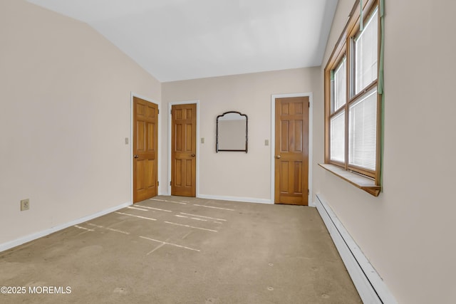 193 Ocean Blvd, Atlantic Highlands, NJ 07716 - carpeted spare room with a baseboard heating unit and vaulted ceiling