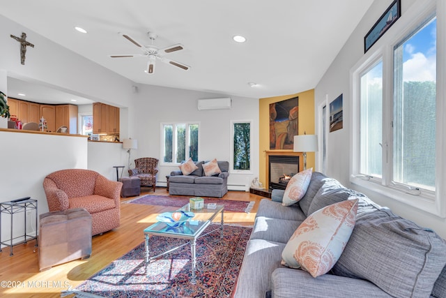 708 New York Blvd, Sea Girt, NJ 08750 - living room with a wall mounted AC, a baseboard heating unit, light wood-style floors, a ceiling fan, and a glass covered fireplace