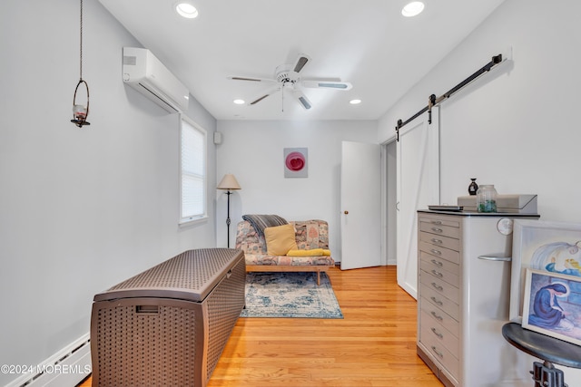 708 New York Blvd, Sea Girt, NJ 08750 - living area with an AC wall unit, a barn door, a baseboard radiator, ceiling fan, and light wood finished floors