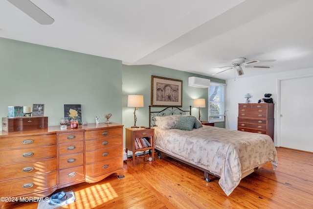 708 New York Blvd, Sea Girt, NJ 08750 - bedroom featuring a wall mounted air conditioner, light wood finished floors, and a ceiling fan